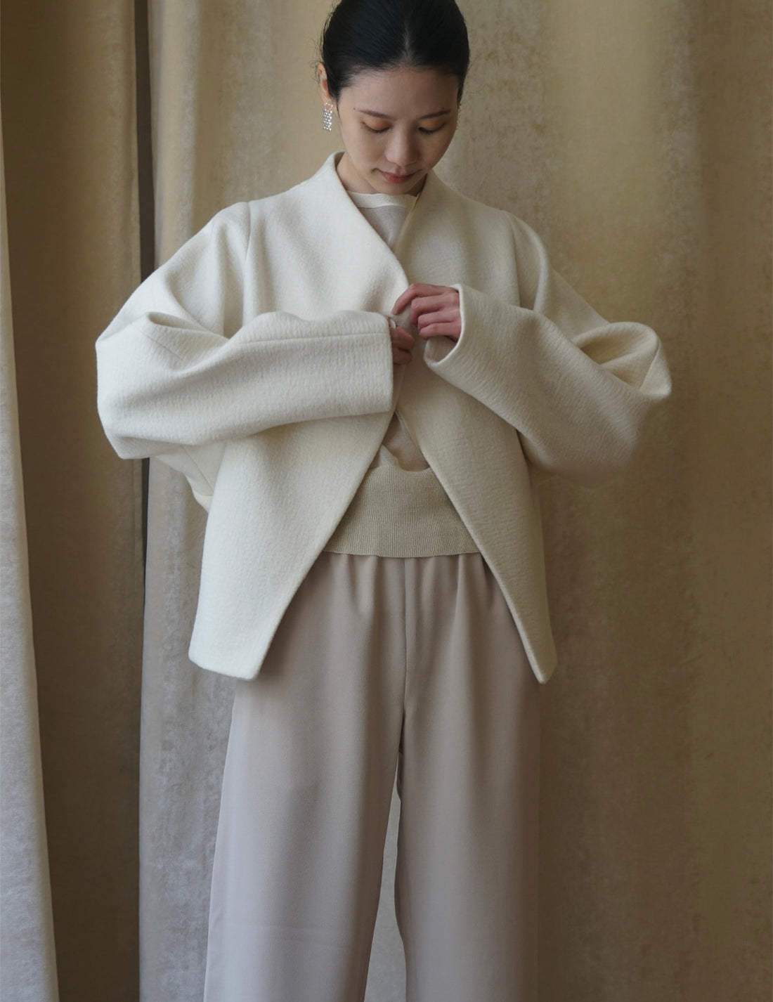 Veste à un bouton avec ligne oblique