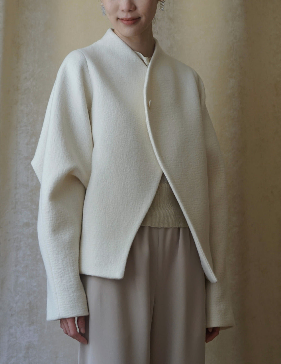 Veste à un bouton avec ligne oblique