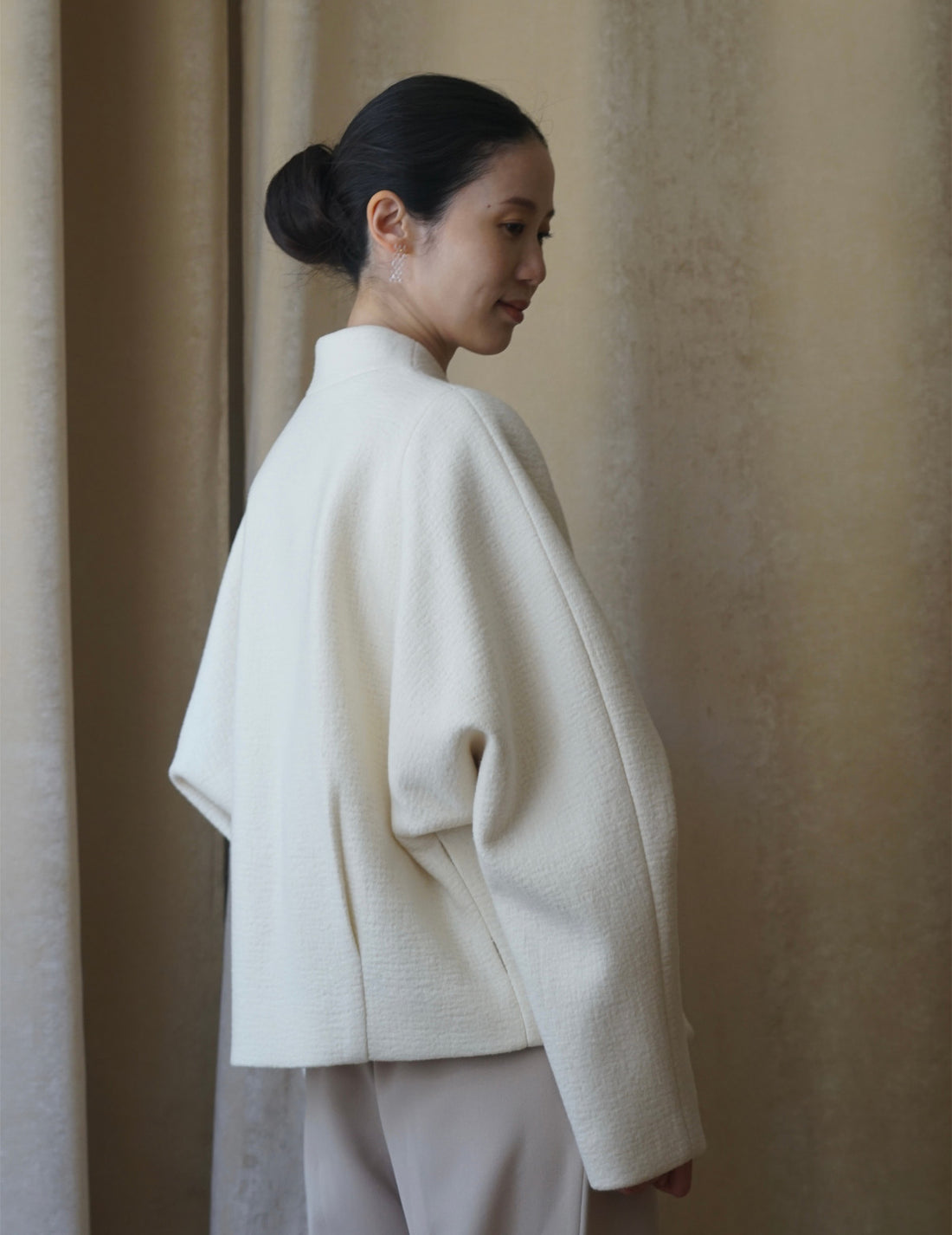 Veste à un bouton avec ligne oblique