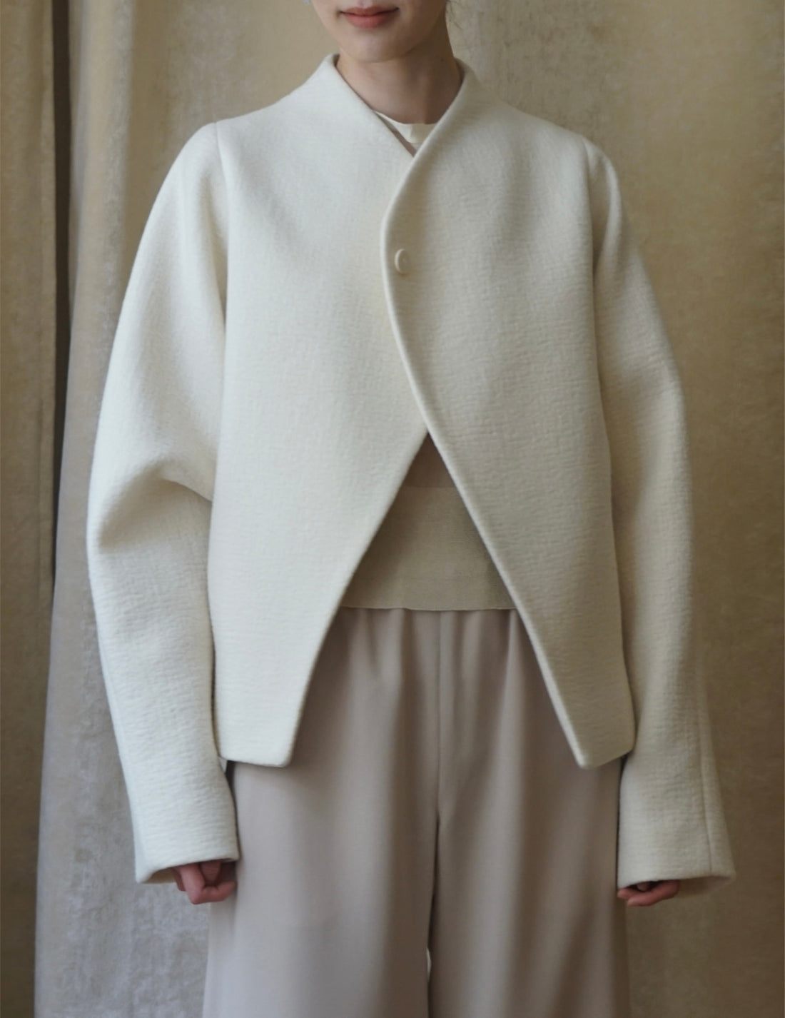 Veste à un bouton avec ligne oblique