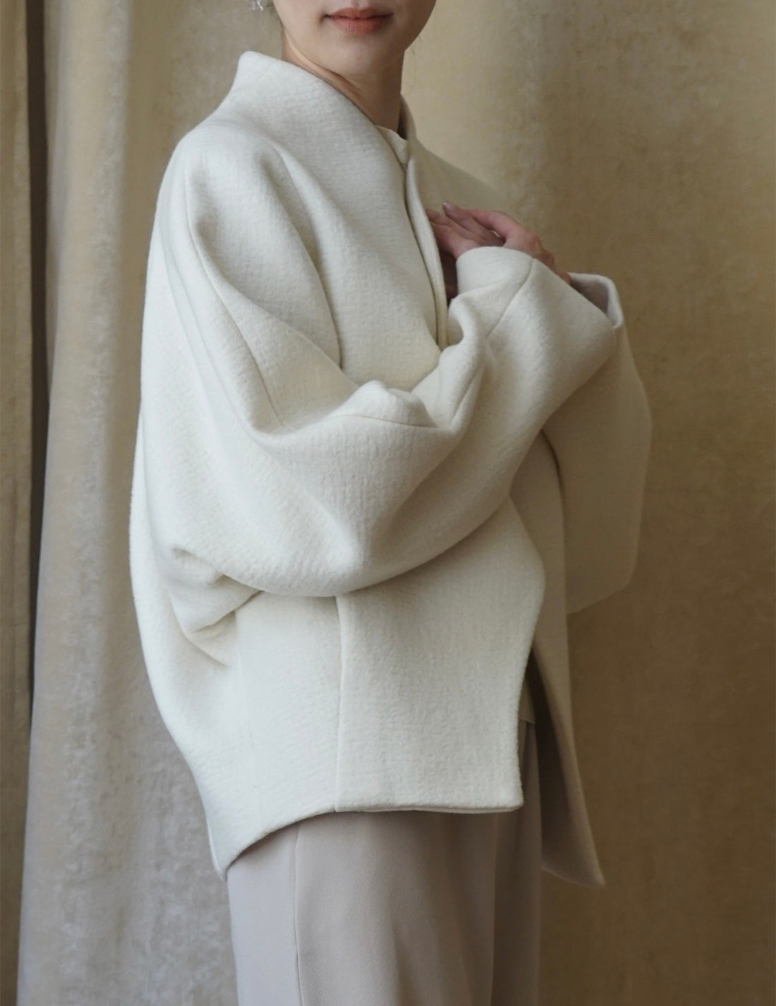 Veste à un bouton avec ligne oblique