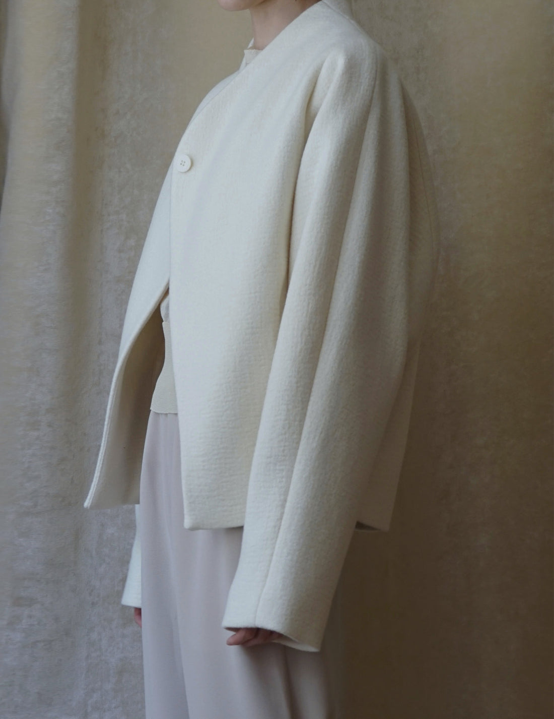 Veste à un bouton avec ligne oblique