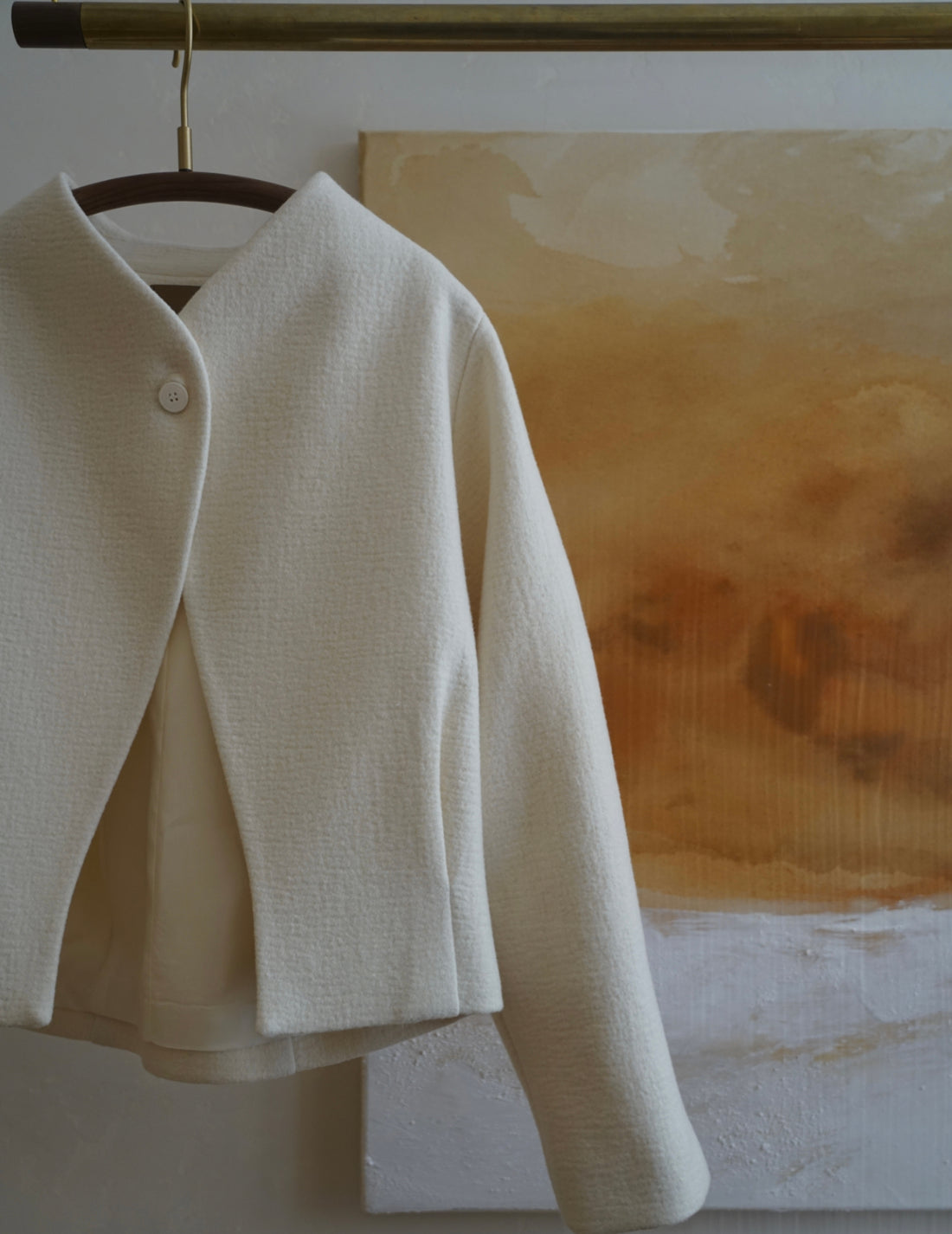 Veste à un bouton avec ligne oblique