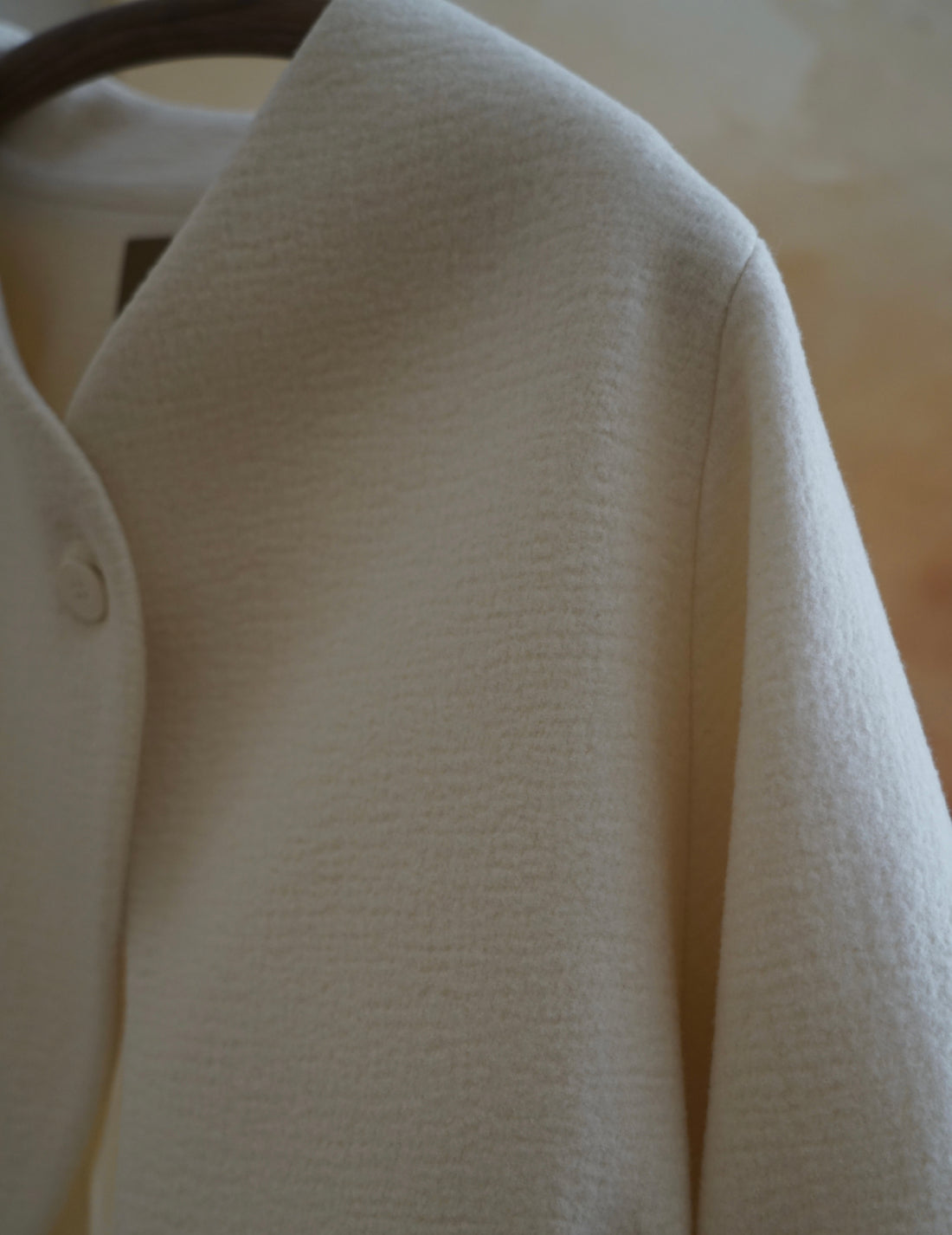 Veste à un bouton avec ligne oblique