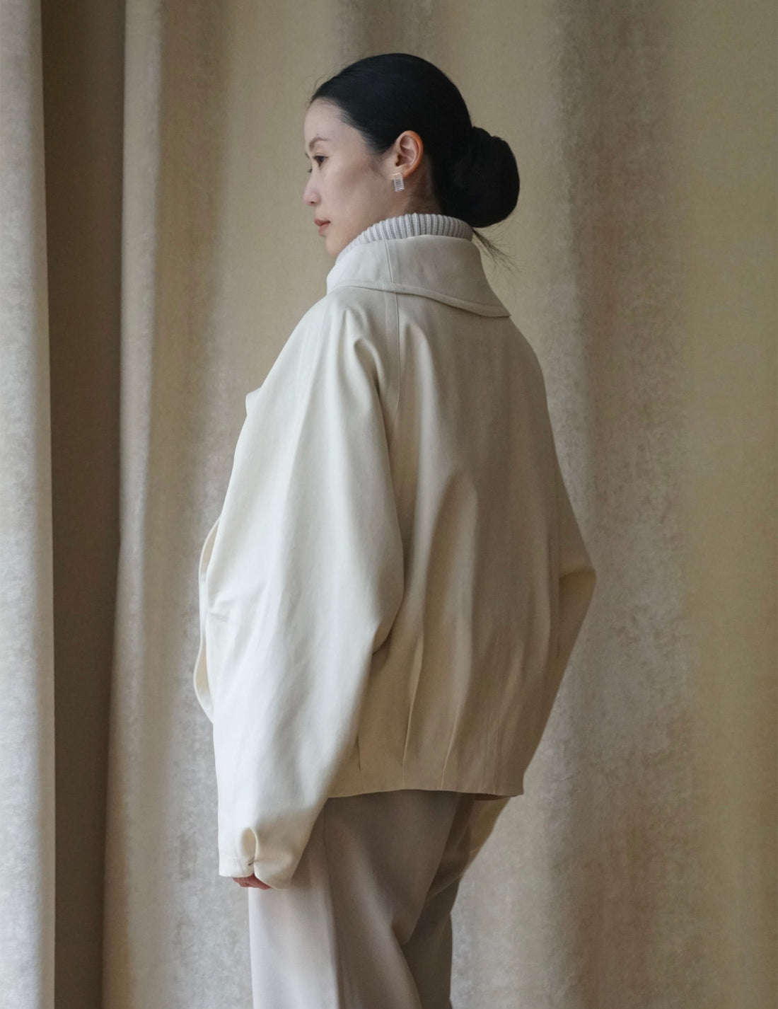 Veste courte à col drapé