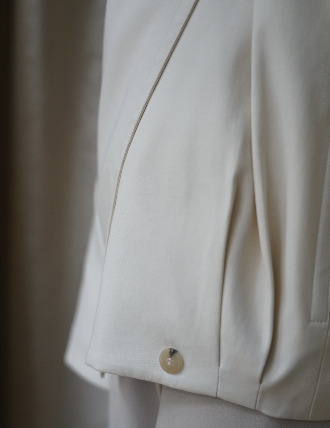 Veste courte à col drapé