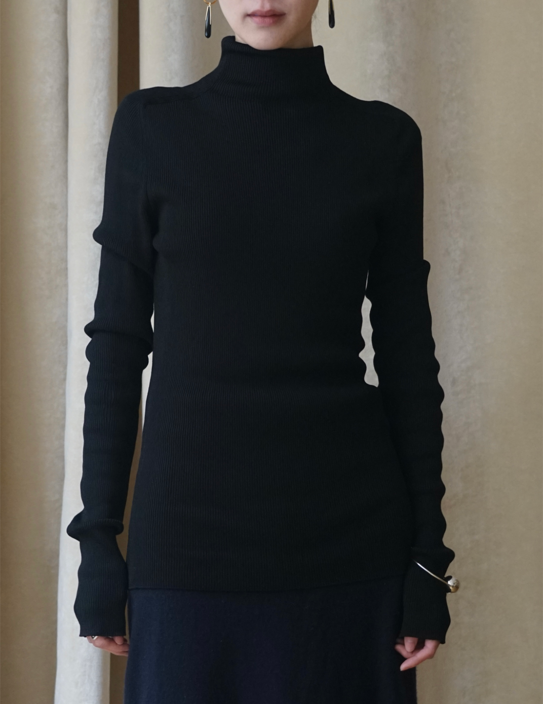 Haut en tricot côtelé à col montant