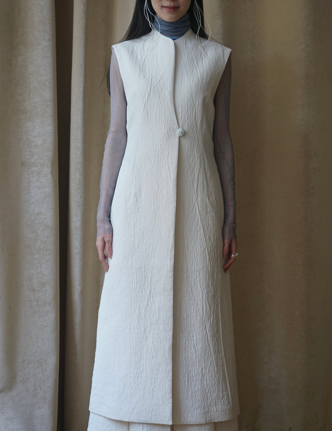 Gilet sans manches teinté en un seul morceau, blanc