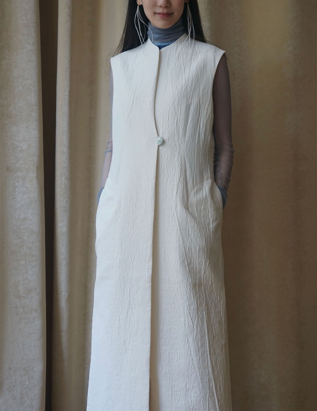 Gilet sans manches teinté en un seul morceau, blanc