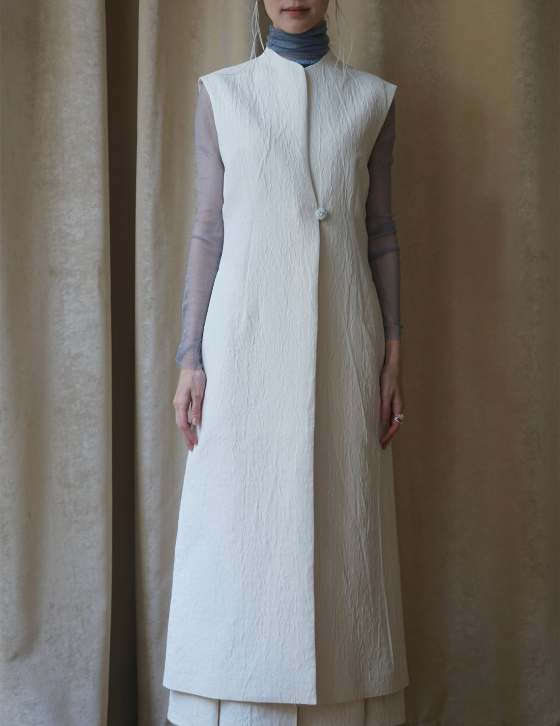 Gilet sans manches teinté en un seul morceau, blanc