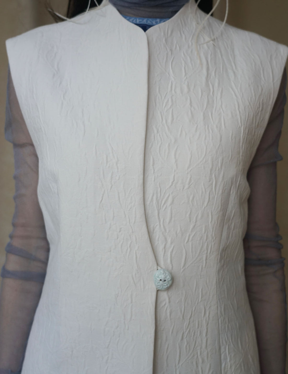 Gilet sans manches teinté en un seul morceau, blanc