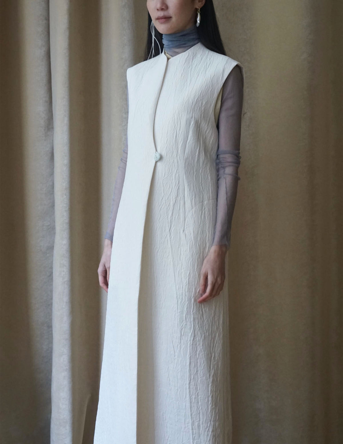 Gilet sans manches teinté en un seul morceau, blanc