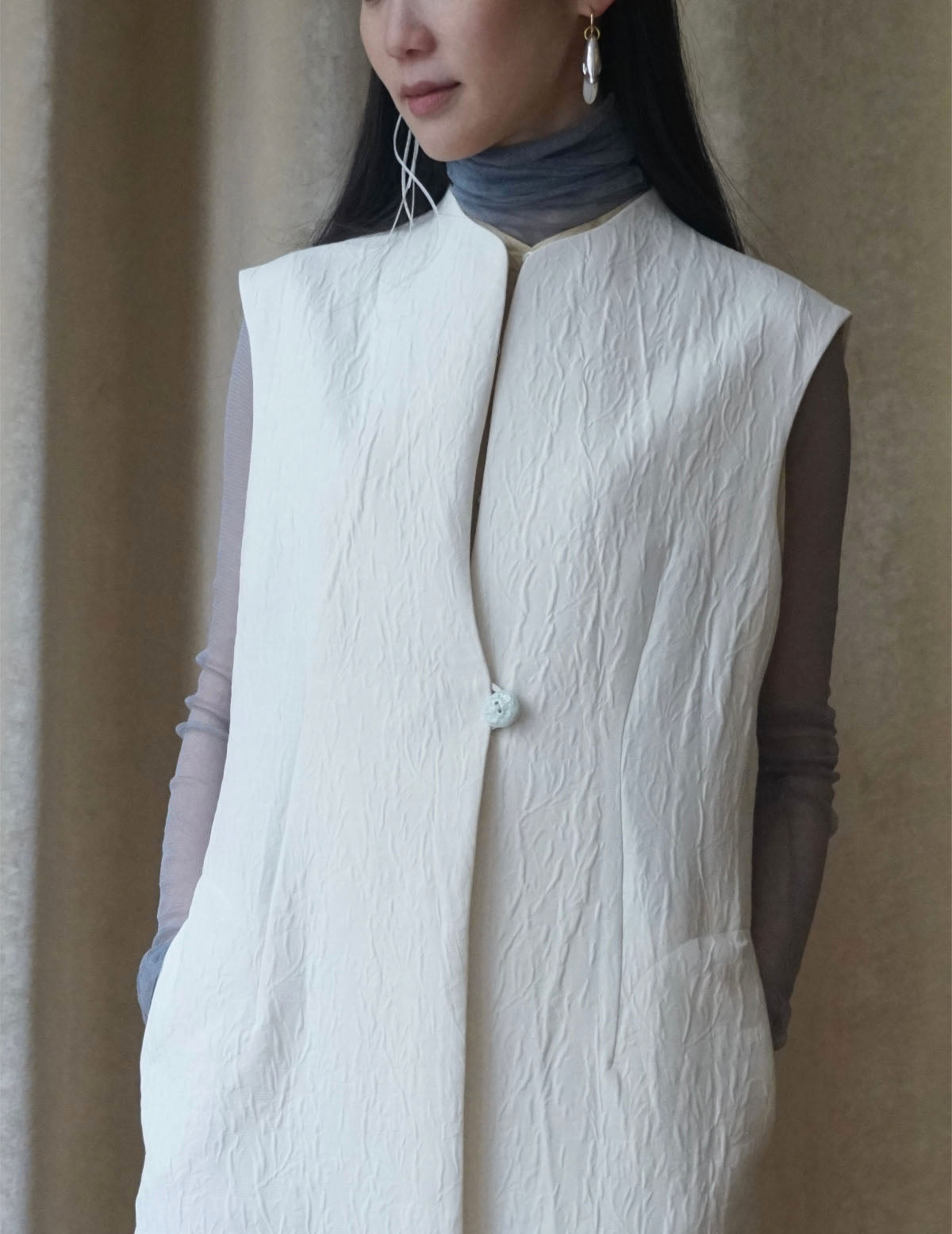 Gilet sans manches teinté en un seul morceau, blanc