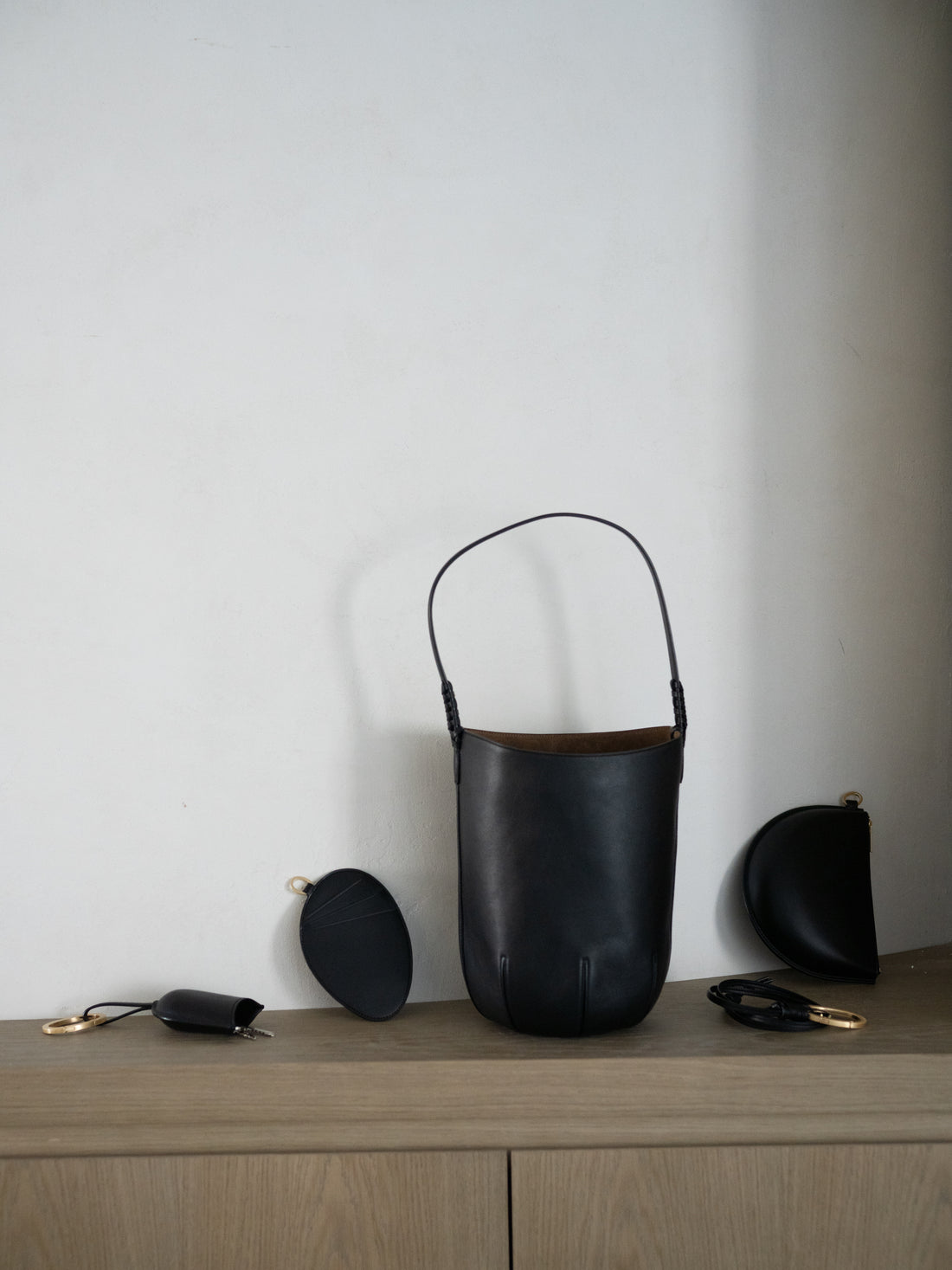 Mame Kurogouchi × Tsuchiya Kaban Monogram 3D Leather Pouch・Black