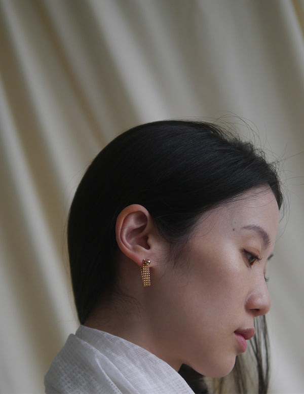 Boucle d'oreille à chaîne pliante