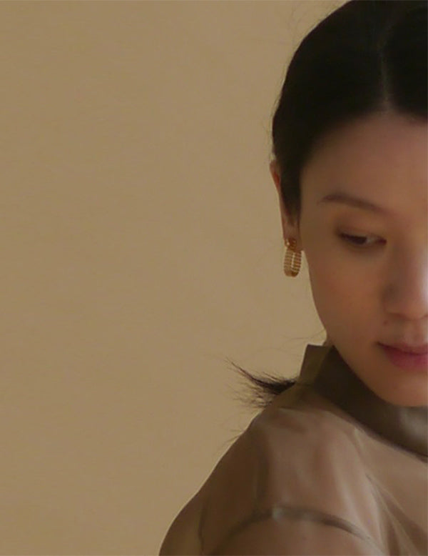 Boucle d'oreille à chaîne pliante