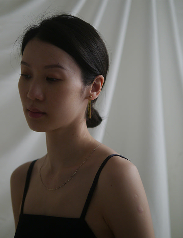 Boucle d'oreille à chaîne pliante