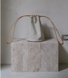 KAMARO’AN | Woven Drawstring Bucket Bag - Ivory