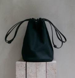 KAMARO’AN | Woven Drawstring Bucket Bag - Black